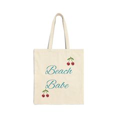 This 100% cotton bag comes in one size - 15" x 16"- perfect for everyday wear. While the canvas material will show off your designs in great colors, it's durable and will last for years. The bag features 20" handles (made from the same canvas), making it easy to carry even with a week's worth of shopping. .: 100% cotton canvas .: Heavy fabric (12 oz/yd² (406.9 g/m .: Sewn-in label .: Available in natural and black colors Eco-friendly Cotton Shoulder Bag For Summer, Trendy Canvas Beach Shoulder Bag, Summer Weekend Cotton Beach Bag, Cotton Bags For Everyday Summer Use, Eco-friendly Cotton Beach Bag For Summer, Trendy Cotton Shoulder Bag For Travel, Casual Beige Cotton Canvas Bag, Trendy Canvas Tote Beach Bag, Summer Weekend Cotton Bag