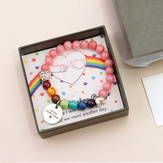 "Rainbow Bridge Pet Memorial Bracelet Pet Memorial bracelet for your beloved Pets. Customize some warm sentences or your pet name on Disc charm . keep them with you always. This Pet Memorial Jewelry is made to keep your sentiments close, is the perfect way to keep your angel close to your heart and a thoughtful gift for those experiencing loss. This is the perfect gift and a unique way to carry your loved pet close to your heart. Memorial Pet Beads Bracelet is packed in a gift box and can be giv Adjustable Personalized Rainbow Jewelry, Pet Collar Memorial, Playful Rainbow Charm Bracelet For Gift, Rainbow Healing Bracelets Hand-strung, Dog Collar Bracelet Memorial, Cat Meeting, Pet Memorial Jewelry, Loss Of Dog, Memorial Bracelet