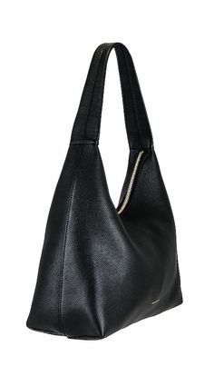 Find MANSUR GAVRIEL Candy Hobo Bag on Editorialist. Mansur Gavriel Candy Hobo Bag in Black. Mansur Gavriel Candy Hobo Bag in Black. Leather exterior with suede lining. Made in Italy. Top zipper closure. One main compartment. Interior leather slip pocket. Integrated shoulder strap. Measures approx 12 W x 11.25 H x 5.5 D Shoulder strap with a 9.5 drop. MANR-WY4. WP23H095WS.