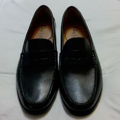 Flag Ltd. Nappa Glove Leather Black Penny Loafers Shoes By Dillard's. Size 11 M Brand New Without Box. Black Business Moccasins With Branded Insole, Business Black Moccasins With Branded Insole, Black Plain Toe Moccasins For Business Casual, Black Loafers With Leather Lining For Business Casual, Black Leather Lined Loafers For Business Casual, Black Wingtip Moccasins With Branded Insole, Black Plain Toe Moccasins For Office, Black Slip-on Moccasins For Semi-formal Occasions, Black Almond Toe Shoes For Business Casual