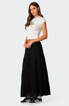 Breezy cotton adds summery allure to this low-rise tiered skirt cut at a flowy maxi length. 100% cotton Machine wash, dry flat Imported Black Tiered Skirt Outfit, Black Flowy Skirt Outfit, Long Flowy Skirt Outfit, Tiered Maxi Skirt Outfit, Black Boho Skirt, Tiered Skirt Outfit, Flowy Skirt Outfit, Black Maxi Skirt Outfit, Black Flowy Skirt