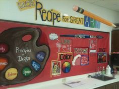 a bulletin board with pictures and words on it in a school kitchen area that is decorated with magnets, crayons, and paper