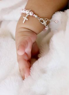 "Personalized Pink Pearl Bracelet for Newborn, Infant, Baby, or Little Girl. This keepsake gift is created with 5mm pink Swarovski crystal pearls, pink Swarovski crystals, a sterling silver heart-shaped initial, 2 sparkling sterling silver stardust spacers, and a heart shaped lobster clasp with a 1/2\" \"Grow-With-Me\" extender chain. You also have your choice of one sterling silver charm, placed near the clasp. ALL metal components are sterling silver. (Star of David charm is silver plated) Arr Personalized Pink Rosary Bracelet For Baptism, Adjustable Pink Jewelry For Baptism, Handmade Pink Jewelry For Baptism, Charm Bracelet Pink, Pink Pearl Bracelet, Silver Initial Charms