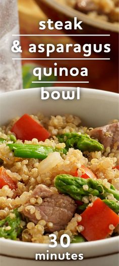 a white bowl filled with rice and vegetables next to a plate of meat, asparagus and quinoa