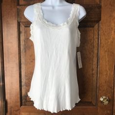 New With Tags; French Laundry; Camisole; Pure White; Large; White Lace Trim; Curled Hem; 100% Cotton; Machine Wash & Tumble Dry; Armpit To Armpit 18"; Armpit To Hem 16"; Length 22" Classic White Tank Top For Daywear, White Layering Camisole Top, White Tank Top With Lace Trim, White Camisole Top For Layering, White Scoop Neck Top With Lace Trim, White Lace Trim Scoop Neck Top, White Cami Tops For Layering, White Lace Tank Camisole, White Lace Top Camisole Tank