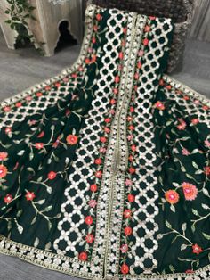 Bottle green georgette dupatta with floral embroidery and gold highlights. Lightweight, yet looks heavy ! Semi-stitched Green Embroidered Fabric, Semi-stitched Embroidered Green Lehenga, Green Semi-stitched Choli With Dupatta, Unstitched Green Choli With Intricate Embroidery, Unstitched Green Embroidered Lehenga, Green Embroidered Sharara In Dola Silk, Designer Embroidered Green Choli, Embroidered Green Sharara In Dola Silk, Green Anarkali Embroidered Fabric With Intricate Embroidery