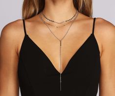 Show off the fashionista you are and layer on the glam with this three row luxe layered necklace set! The pack features two necklaces. including one dainty chain adorned with round bead details. The other features a two row layered necklace. the shorter layer consisting of a flat chain link design. and the longer layer cascading to a lariat with bar accents. Each necklace includes an adjustable lobster clasp closure. Sequin Top Dress, Platform Shoes Boots, Spring Trends Outfits, Two Necklaces, Layered Necklaces Silver, Link Design, Layered Necklace Set, Dainty Chain, Floral Outfit