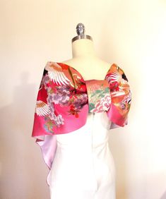 Gorgeous vintage gold wedding KIMONO - in shawl. It's so beautiful and high grade of gold brocade. Amazing colors! real treasury! So pretty and gorgeous enough, suitable for a wedding or any special occasion. Stunning Fuchsia/Pink/Rose gold, crane and flowers woven pattern and embroidery. (The real gold/silver foil thread partly included) OBI back style like a butterfly. * The clip brooch on the picture is not included. ** Made to order item; 1~2 weeks to finish. **The pattern may change a little due to cutting. Age Product-New, KIMONO fabric ~1990 (used only few times at the ceremony), silk gold brocade, medium weight fabric Lining- pastel pink silky polyester matte satin Size free Whole length-80.3"(204cm) width -12.4"(31.5cm) *Dry cleaning carefully *Low iron with pressing cloth Postage Vintage Gold Wedding, Cherry Blossom Flower, Shawl Wedding, Pink Kimono, Wedding Kimono, Gold Brocade, Sakura Cherry Blossom, Cherry Blossom Flowers, Wedding Vintage