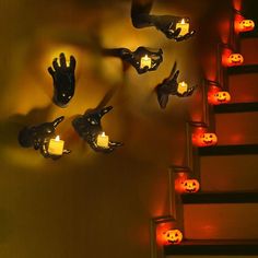 halloween decorations on the wall with candles