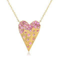 Ross-Simons - .50ct t. w. Pink Sapphire Heart Necklace in 14kt Yellow Gold. 16". Dotted with .50 ct. t. w. round pink sapphires, this on-trend heart necklace is oh so sweet and stylish. Crafted in polished 14kt yellow gold and stationed on a classic cable chain with a 2" extender. Textured and polished finishes. Springring clasp, pink sapphire heart necklace. Pink Diamond Necklaces For Mother's Day, Mother's Day Pink Diamond Necklace, Pink Diamond Heart Cut Necklace, Pink Heart-shaped Diamond Cut Jewelry, Pink Heart-shaped Diamond Necklace, Heart Cut Pink Gold Necklace For Anniversary, Pink Gold Heart Cut Necklace For Anniversary, Valentine's Day Yellow Gold Gemstone Heart Necklace, Valentine's Day Yellow Gold Heart Gemstone Necklace