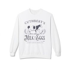 Looking for that perfect comfy cotton blend Anne of Green Gables themed fleece crewneck sweater? Then look no further! This sweatshirt inspired by the classic children's literature hit makes a great gift for English teachers, daughters, mothers, for birthdays, Christmas or just because!  Crafted from a blend of 80% ring spun cotton and 20% polyester, with a brushed interior and 100% ring spun cotton face, this sweatshirt offers unmatched comfort and durability. Featuring a dropped shoulder design for a relaxed fit, this sweatshirt is not only stylish but also eco-conscious. Partnering with Better Cotton to enhance cotton farming worldwide, and made with OEKO-TEX certified low-impact dyes, you can feel good and look even better. English Teacher Gifts, Anne Of Green, Anne Of Green Gables, Green Gables, Children's Literature, Book Lovers Gifts, Teacher Shirts, Crew Neck Sweater, Book Lovers