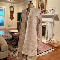 Brand New Never Worn Indian/Pakistani Sherwani And Pant With Embroidered Jacket Beautiful White Embroidery Detail Against A True Gray Underlay Fabric. The Shirt Underneath Sporting Detailed Buttons, Creating A Formal Look. The White Pants Come With The Set, Completing The Traditional Ensemble. Fits As A Men’s M In Western Clothes. Serious Purchaser Inquiries Regarding Further Photos And/Or Measurement Details Are Welcomed. Traditional Straight Kurta Outerwear With Intricate Embroidery, Traditional Embroidered Straight Kurta Outerwear, Traditional Resham Embroidery Transitional Outerwear, Festive Chikankari Embroidered Straight Kurta Outerwear, Festival Straight Kurta With Chikankari Embroidery, Chikankari Embroidery Straight Kurta For Festivals, Fitted Chikankari Embroidery Outerwear For Transitional Season, Fitted Outerwear With Chikankari Embroidery For Transitional Season, Transitional Traditional Outerwear With Intricate Embroidery