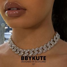 The 16mm Cuban Baguette Necklace is an upgraded version of the classy Cuban Link Necklace. Featuring both the round cut and the baguette-shaped prong-set stones. This is a statement piece that will do the talking for you. DESIGNED IN SCOTLAND BY BBYKUTE Luxury Classic Diamond Necklace With Curb Chain, Luxury Diamond Necklace With Baguette Cut Diamonds, Luxury Silver Chain Necklace For Party, Trendy Diamond Jewelry With Bling, Luxury Chain Jewelry For Parties, Trendy Diamond Bling Jewelry, Luxury Diamond Necklace For Party, Luxury Crystal Diamond Necklace For Party, Luxury Iced Out Diamond Necklace