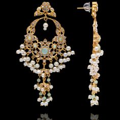 Intricate design weaved together to create a harmonious symphony of opulence and refinement! Immerse yourself in the grandeur of these exquisite chandelier earrings, meticulously adorned with resplendent pearls and radiant gemstones. Approximate earrings length is 4.25". Gold-plated on high-quality brass as base metal. Made by order. Kindly allow 5-7 weeks for the delivery of this item. For custom or urgent requests, please contact support@alacouture.com. *Please Note: We use faux stones and bea Elegant Jeweled Chandbali Pearl Earrings, Elegant Jeweled Chandelier Earrings For Festive Occasions, Elegant Jeweled Pearl Earrings For Festive Occasions, Elegant Chandbali Chandelier Earrings With Pearl Drop, Luxury Drop Chandelier Earrings With Intricate Design, Elegant Chandbali Earrings With Dangling Beads, Luxury Intricate Design Drop Chandelier Earrings, Luxury Intricate Design Chandelier Drop Earrings, Elegant Chandbali Beaded Earrings With Dangling Beads