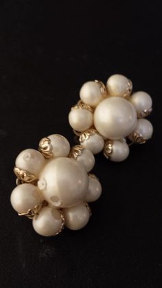 This pair of vintage 1950s faux pearl clip on earrings are really pretty, they have a luster that shines from them and they are crafted in silver tone metal, one of the beads has been scratched or even could have been a manufacturing error., because they are in excellent shape otherwise. Vintage Pearl Clip-on Earrings For Gift, Vintage Pearl Clip-on Earrings As Gift, Vintage Pearl Clip-on Earrings For Formal Occasions, Vintage White Pearl Clip-on Earrings, Vintage Pearl Clip-on Earrings, Vintage Formal Clip-on Earrings With Pearl Drop, Vintage Formal Clip-on Pearl Drop Earrings, Vintage Pearl Clip-on Earrings For Wedding, Vintage Formal Pearl Drop Clip-on Earrings