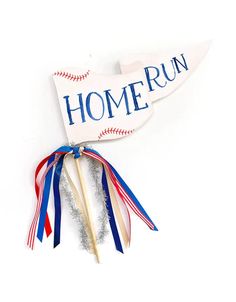 a baseball bat and some red white and blue streamers with the word home run on it