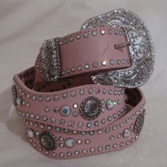 Vintage Nocona Pink Leather Belt Embellished With Swarovski Crystals, Scalloped, Engraved Silver Buckle & Silver Studs. Crystals Change Color As The Light Hits Them .... Gorgeous! 1996. High Sparkle Belt ... Highly Collectible. Tag Size: Xl. Measurements: Buckle: 2.5" X 3", Length (Leather Only - Measured End To End) 44", Width 1.5". Good Distressed Condition, No Crystals Are Missing. Obvious Scratches On Silver And A Couple Of Minor Marks On Leather. Non-Smoking Home. Item: 34752 Bin11 Cowgirl Belt, Nocona Belt, Western Glam, Pink Cowgirl Boots, Bling Belts, Cowgirl Bling, Boot Bling, Pink Cowgirl, Rhinestone Cross