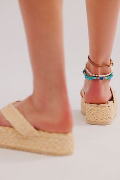 An attitude-packed summer style gets a beachy twist with these braided sandals from Matisse, featured in a flatform style with woven raffia uppers for a breezy touch. **Features:** Slip-on style, backless design, woven raffia uppers, thong straps, flatform sole **Why We | Sailor Thong Sandals by Matisse at Free People in Tan, Size: US 11 Platform Sandals For Beach Season Vacation, Beach Toe Post Wedge Sandals With Platform, Beach Toe Post Platform Wedge Sandals, Summer Toe Post Wedge Sandals For Beach, Braided Flip Flops For Beach, Braided Summer Flip Flops, Summer Vacation Wedge Sandals With Toe Post, Summer Vacation Wedge Heel Flip Flops, Platform Toe Post Flip Flops For Beach