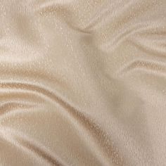 an up close shot of a beige fabric