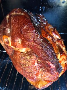 the meat is cooking in the oven on the rack and ready to be grilled