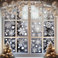 a window with snowflakes and christmas lights on it