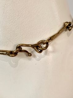 Elegant Hand Forged Choker Necklaces, Ceremonial Unique Bronze Jewelry, Unique Bronze Bracelet Jewelry, Elegant Hand Cast Brass Necklaces, Unique Brass Choker Jewelry, Bronze Link Jewelry As A Gift, Unique Brass Choker Necklace, Formal Bronze Brass Jewelry, Hand Cast Yellow Gold Jewelry