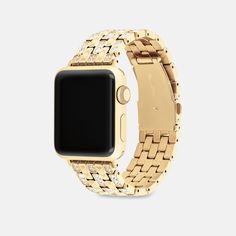 Made exclusively for use with the 38mm 40mm and 41mm Apple Watch® this dazzling gold tone link bracelet strap is etched with our Signature and detailed with pavé crystals for a sparkly touch. | Coach Apple Watch® Strap, 38 Mm, 40 Mm And 41 Mm - Women's - Gold Elegant Gold Metal Apple Watch Band, Luxury Gold Metal Watch Bands, Elegant Gold Stainless Steel Apple Watch Band, Timeless Gold Bracelet Strap Apple Watch Band, Luxury Gold Diamond Watch With Stainless Steel, Luxury Gold Diamond Watch In Stainless Steel, Modern Gold Diamond Watches, Luxury Gold Apple Watch Band With Bracelet Strap, Timeless Gold Apple Watch Band For Formal Occasions