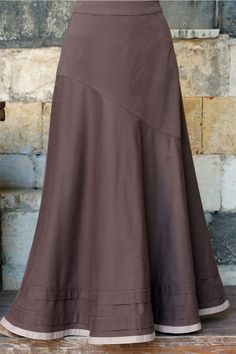 Aysmmetrical Flared Skirt Pinecone, Elegant, practical, and versatile, this skirt covers all the critical style basics. Dress it up for special occasions, add a buttoned blouse for the office, or keep it casual for the weekend. The forgiving silhouette and subtle details work almost anywhere. #skirt #maxiskirt #longskirt #muslimfashion #afflink #womensfashion #islamicclothing #modestfashion #skirtoutfits #longskirtoutfits #modernskirts #fashionoutfits #casual Basic Dress Pattern, Flare Maxi Skirt, Long Skirt Outfits, Brown Skirt, Style Basics, Stylish Skirts, Womens Maxi Skirts, Islamic Clothing, Long Maxi Skirts