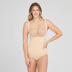 The Remarkable Results Open-bust Panty Bodysuit uses breathable, comfortable compression to tone the tummy and thighs, and gives you a perky rear view. And, best of all? The bodysuit style provides added tummy control and eliminates muffin top, while the lightweight, seamless design offers sleek, easy wear for every day. Compression Wear, Open Bust, Bodysuit Fashion, Muffin Top, Black Bodysuit, Rear View, Easy Wear, Shapewear, Women's Intimates