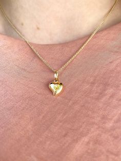 Delight your sweetheart (or yourself) with the gift of this 3D heart pendant made from luxurious 14K Yellow Gold. This pendant suspends from a 16-inch chain that secures with a spring-ring clasp. This style is both simple & striking that can be worn on the daily. Effortlessly chic, a timeless necklace that you can also stack up what your favorites!! Metal: Real 14K Yellow Gold (Stamped) Closure of Necklace: Spring- Ring Clasp Heart Pendant Dimensions: Small: approx. Width: 0.7 Height: 0.9 cm Yellow Gold Heart Necklace As Gift For Her, 14k Gold Heart Cut Necklace For Her, Delicate Yellow Gold Heart Pendant Necklace, Delicate Yellow Gold Heart Necklace For Gift, Yellow Gold Heart Necklace With Birthstone For Her, Delicate Yellow Gold Heart Necklace As Gift, Heart Pendant Necklace For Anniversary, Yellow Gold Heart Pendant Necklace For Her, Yellow Gold Heart Necklace With Heart Charm