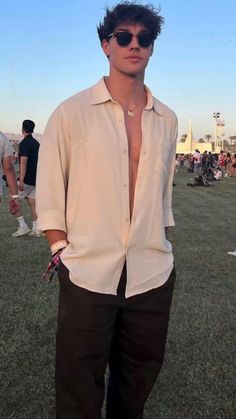 What to wear?  • Plain casual shirt  • Neutral colored clothes Festival Outfits Men Aesthetic, Boys Coachella Outfits, Guy Festival Outfit Men's Fashion, Mens Festival Outfits 2023, Men Outfits Coachella, Concert Outfits Men Summer, Mens Festival Fashion Summer, Mens Cochella Outfits For Men, Summer Looks 2023 Men