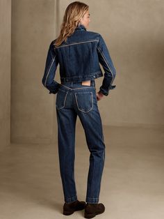 Always ready for adventure, this vintage straight jean is modeled after the classics and cut from a beautiful, dimensional denim accented with vegan leather piping at the pockets and seams.  VINTAGE STRAIGHT FIT: High-waisted and cheeky, these retro- Denim Cropped Straight Leg Jeans With Contrast Stitching, Dark Wash Cropped Jeans With Contrast Stitching, Dark Wash Cropped Denim Jeans With Contrast Stitching, Mid-rise Cropped Denim Jeans With Contrast Stitching, Medium Wash Straight Leg Jeans With Contrast Stitching, Fitted Dark Wash Jeans With Contrast Stitching, Fitted Jeans With Contrast Stitching For Work, Classic Fitted Jeans With Contrast Stitching, Fall Jeans With Seam Detailing In Medium Wash