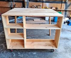 a wooden shelf sitting inside of a garage