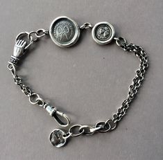 "A lovely sterling silver handmade bracelet in the style of an Antique Albertina chain.... The Albertina is the ladies version of the Albert Watch chain. It is smaller and more decorative than an Albert and mainly worn by Ladies during the Victorian era. Often they are altered and are worn today as beautiful antique bracelets. This is my take on the Albertina using SWALK seals from my collection to personalise it and give it special meaning. This bracelet is not restricted to these two seals and Wax Letter Seal, Letter Seal, Antique Wax, Chunky Bracelet, Antique Bracelets, Chunky Bracelets, Knot Bracelet, String Bag, Watch Chain