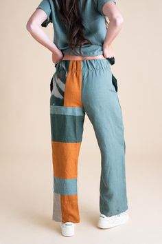 Stand out in our Patchwork Sunset Pants—a one-of-a-kind masterpiece crafted from a collection of cotton and linen fabric scraps we've carefully saved throughout the year. These unique pants are perfect for transitioning effortlessly between summer and fall, and back again. Features: One-of-a-Kind Design: Each pair is a unique patchwork of carefully selected fabric scraps. Versatile Styling: Ideal for shifting seasons, blending summer ease with autumn warmth. Pull-On Comfort: Easy to wear with a Patchwork Relaxed Fit Ankle-length Bottoms, Green Patchwork Bottoms With Relaxed Fit, Green Patchwork Straight Leg Pants, Patchwork Long Pants For Loungewear, Cotton Pants With Patchwork, Cotton Patchwork Wide-leg Pants, Cotton Patchwork Straight Pants, Cotton Patchwork Pants, Cotton Patchwork Trousers