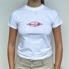 "save the drama baby tee in white made to order  available in sizes xs - xl - see photo 5 for sizing Model is wearing size S in the pics of the black tee and size S in the white tee and a 6/8 - For reference, model is 5'5 with 31\" bust and 26\" waist Please note 'Primary Colour' refers to the T Shirt colour." Fitted White T-shirt With Text Print, White 90s Style Crew Neck Top, Basic White Tops With Screen Print, Fitted White Graphic Tee, Fitted White Screen Print T-shirt, Unisex White Cotton Tops, White Y2k Pre-shrunk Tops, Fitted White T-shirt With Screen Print, White Unisex Cotton Top