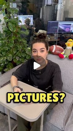 a woman sitting at a table with a stuffed animal on it's head and the words pictures?