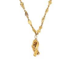 This is part of Chairish’s Fine Jewelry assortment.  Finely detailed antique Victorian gold nugget necklace (circa 1880s to 1900s), crafted with a 14 karat yellow gold chain and 22k to 24k natural gold nuggets.   The bold and distinct Victorian era necklace highlights a beautiful display of 28 natural gold nuggets. One larger chunkier nugget (1 x 1/2 inch) is set to the 1 1/4 inch drop. Each nugget is created by nature herself, unique, and shines in a bright buttery yellow gold. The collectible Natural Gold Nugget, Masonic Jewelry, Art Deco Pendant Necklace, Russian Jewelry, Vintage Jewelry Antique, White Gold Pendant Necklace, Victorian Pendants, Antique Jewelry Necklace, Nugget Necklace