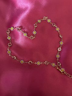 Elevate your accessory game with our Daisy Chain Necklace in gold. This piece features delicate daisies on a stunning gold chain, perfect for adding a touch of spring/summer to any outfit. stainless steel necklace costume jewellery  short necklace with attached extender. Chain length approx 38cm. Daisy Chain Necklace, Daisy Chain, Steel Necklace, Short Necklace, Stainless Steel Necklace, Chain Lengths, Chain Length, Gold Chain, Chains Necklace