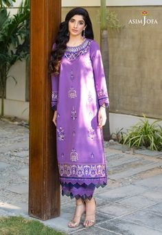 FABRIC: CAMBRICCOLOR: PURPLE Mawra styles this dress gracefully. The purple outfit is delicately crafted with embroidery using hues of cream and purple threads. Finished with matching pants. This design will be valued addition in your casual wardrobe.Fabric (2pc):Shirt: CambricTrouser: Cambric DESIGN DETAILS: 1.25m Embroidered front on cambric. 1m Embroidered sleeves on cambric. 1 Embroidered neckline on organza. 1.5m embroidered border for front and back. 1.25 Dyed plain cambric for back. 2.5m Elegant Purple Sets With Intricate Embroidery, Elegant Purple Sets With Resham Embroidery, Elegant Purple Sets With Dabka Work, Elegant Purple Kurta For Eid, Elegant Purple Straight Kurta Set, Elegant Purple Straight Kurta, Purple Floral Embroidery Sets For Eid, Elegant Purple Kurta With Dabka Work, Formal Purple Kurta With Dabka Work