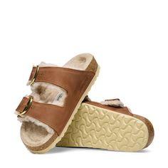 Birkenstock Arizona Big-Buckle Shearling-Lined Sandals in Cognac/Sandcastle Oiled Leather Shearling, Size IT 40: It’s the iconic two-strap style you know and love, now lined with a plush layer of shearling to keep your feet warm during the cool months. Topped with big shiny gold-tone buckles, they make fabulous house shoes, if you ask us. Leather, shearling, cork, EVA. Birkenstock Arizona Big Buckle, Arizona Big Buckle, Womens Casual Boots, Women's Shoes Accessories, Hiking Sandals, Waterproof Winter Boots, Calf Socks, Pull On Boots, Birkenstock Arizona