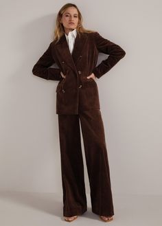 Soft corduroy gives The Agnes Blazer a throwback academic feel with a slightly oversized, yet tailored, fit. Flap pockets, faux horn buttons and striped lining make this double-breasted blazer a must. Pair it The Lana Cord Pant for head-to-tie styling. 100% CottonAdrianna is 5'9" wearing size Extra-Small Wool Suit Women, Vintage Winter Coats Women, Dark Brown Suit Women, Corduroy Suit Women, Corduroy Blazer Outfit, Academic Style, Corduroy Suit, Western Suits, Formal Jacket