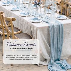 the table is set for an event with blue linens and silverware on it