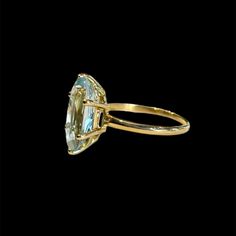 Coming to us from the Art Deco: A glowing and dewy marquise Aquamarine in a timeless ring setting. Art Deco, handmade with 18k yellow gold and Aquamarine Features a 2.70ct marquise Aquamarine, measuring approx. 14x7mm Aquamarine set in secure 6-prong setting Currently size 7.5; sizable Because we do all our restoration work by hand, we can offer a huge array of customization. If you have inquiries about sizing, alterations, or engraving, you can inquire about a quote here. As with all antiques, Luxury Diamond Ring With Marquise Cut, Luxury Diamond Ring With Marquise Cut Gemstone, Luxury Marquise Cut Sapphire Ring, Luxury Marquise-cut Rings For Formal Occasions, Luxury Marquise Cut Ring For Formal Occasions, Formal Marquise Sapphire Ring With Vvs Clarity, Marquise Sapphire Ring With Vvs Clarity For Formal Occasions, Marquise Solitaire Yellow Gold Diamond Ring, Yellow Gold Solitaire Marquise Diamond Ring