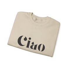 Stay warm and stylish with the Ciao Sweatshirt! The ribbed collar and medium-heavy fabric blend of cotton and polyester provide ultimate coziness. No more itchy side seams, thanks to the tear-away label. Available in sand, gray, or white from Gildan. Made using 100% ethically grown US cotton. Gildan is also a proud member of the US Cotton Trust Protocol ensuring ethical and sustainable means of production. The blank shirt's dyes are OEKO-TEX-certified dyes with low environmental impact. Fabric b Everyday Beige Cotton Sweatshirt, Beige Crew Neck Sweatshirt With Ribbed Collar, Beige Cotton Sweatshirt With Letter Print, Beige Cotton Sweater With Letter Print, Beige Crew Neck Sweatshirt With Graphic Print, Bling Bags, Custom Design Shoes, Bling Shoes, Stay Warm