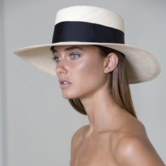 The Ibiza is this season’s playful reimagining of the classic Panama hat, featuring a wider than usual band for a fresh, sophisticated look. HANDMADE IN ECUADOR 100% NATURAL TOQUILLA STRAW BRIM SIZE: 4" SIZE-ADJUSTABLE INNER BAND Modern Fedora Panama Hat For Spring, Modern Panama Hat With Short Brim For Spring, Modern Curved Brim Hats For Spring, Classic Spring Hat With Flat Crown, Modern Spring Hats With Curved Brim, Modern Spring Hat With Curved Brim, Modern Spring Brimmed Hat, Modern Flat Brim Fedora For Spring, Classic Spring Fedora With Flat Crown