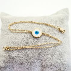 - Evil Eye Mother of Pearl Bracelet for Women is made with high quality 14K real solid gold . -We have listed a necklace with the same design. https://www.etsy.com/listing/937997647/evil-eye-mother-of-pearl-necklace-for - Circle bracelet is with decorated mother of pearl . Its diameter is 1 cm(0.39 inch) - 14K cute, charm, dainty, delicate, elegant Evil Eye Mother of Pearl Necklace is also called Turkish nazar protection, lucky, good luck, Greek eye bracelet . - You receive evil eye mother of pe 14k Yellow Gold Bracelet Gift, Gift 14k Yellow Gold Bracelet, White Gold Round Chain Bracelet As Gift, White Gold Round Chain Bracelet Gift, Round White Gold Chain Bracelet As Gift, Gold Spiritual Bracelets, Gold-plated Yellow Gold Charm Bracelet Gift, Yellow Gold Plated Charm Bracelet Gift, Spiritual Yellow Gold-plated Bracelets