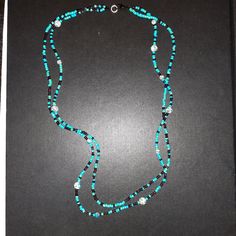 This beautiful blue necklace can be worn casually. Elegant Large Beads Turquoise Necklace, Elegant Turquoise Necklace With Large Blue Beads, Elegant Blue Turquoise Necklace With Large Beads, Elegant Beaded Turquoise Necklace For Beach, Elegant Blue Turquoise Necklace With Colorful Beads, Blue Single Strand Long Beaded Necklace, Blue Long Single Strand Beaded Necklace, Elegant Blue Turquoise Necklace With Faceted Beads, Elegant Light Blue Necklace With Beaded Chain