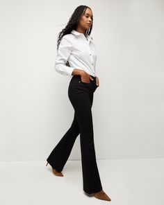 In a sophisticated dark wash, the Beverly jean features a high-rise waist that is fitted through the hips and thighs with a subtly flared leg. High quality stretch denim offers a flattering look with a flexible fit. Tuck in any of our tops and add sky-high heels for an elongating silhouette. Dark Wash Flare Pants For Work, Classic Dark Wash Flare Jeans For Work, Elegant High Rise Jeans, Elegant Mid-rise Dark Wash Flare Jeans, Elegant High Rise Jeans For Work, Elegant Fitted Mid-rise Flares, Chic Mid-rise Jeans For Business Casual, Chic Fitted Flare Jeans For Work, Fitted Flare Jeans With Elegant Style