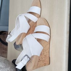 Wedge Cork With Side Buckle . No Marks. Never Worn. White Wedge Sandals With Buckle Closure, White Wedge Heel Sandals With Heel Strap, Casual White Wedge Sandals With Heel Strap, White Ankle Strap Wedge Sandals With Cushioned Footbed, White Wedge Sandals With Cork-bed Midsoles, White Casual Wedge Sandals With Buckle Closure, White Synthetic Wedge Heel Sandals, White Wedge Sandals With Ankle Strap And Buckle Closure, White Ankle Strap Wedge Sandals With Buckle Closure